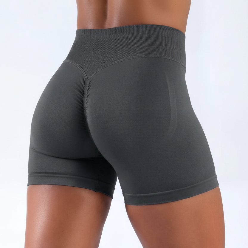 Dark gray athletic FormFlex™ Ribbed Shorts worn by a person on a white background