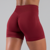 Maroon athletic FormFlex™ Ribbed  shorts worn by a person on a white background