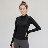 Woman wearing a Formflex High Neck Jacket in black  on a light gray background