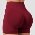 Maroon high-waisted SoftForm™ High-Rise Shorts  on a plain background