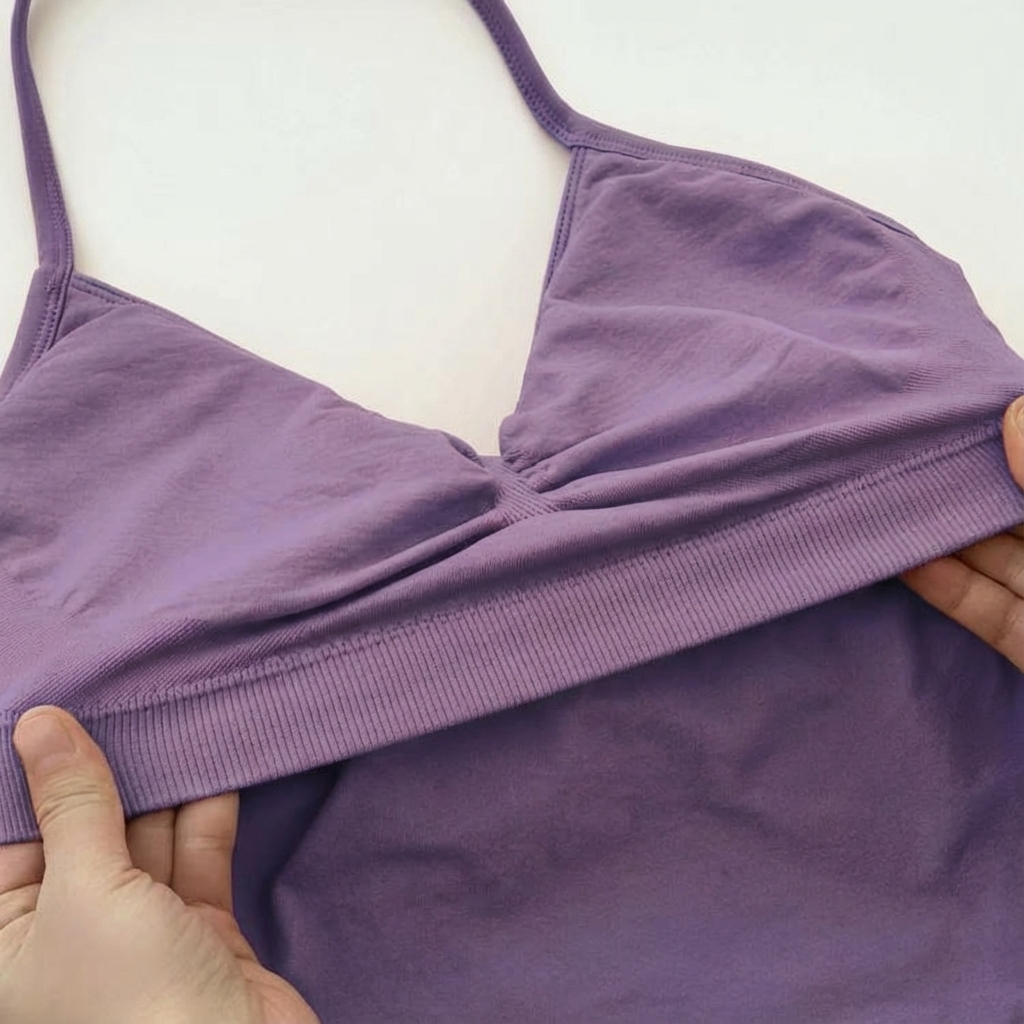 Purple SoftForm™ Tank held by hands on a white background